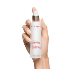 Clarins Bust Beauty Firming Lotion | Visibly Firms, Smoothes and Tones Skin on Bust and Décolleté | Hydrates and Softens | Lightweight and Fast Absorbing | All Skin Types | 1.7 Ounces